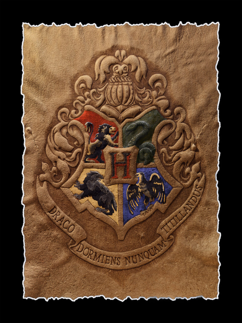Photo of Cave Geek Art's Harry Potter Hogwarts Crest Giclée Reproduction burned on buckskin leather and painted with primitive tools showing the hand-deckled edges.
